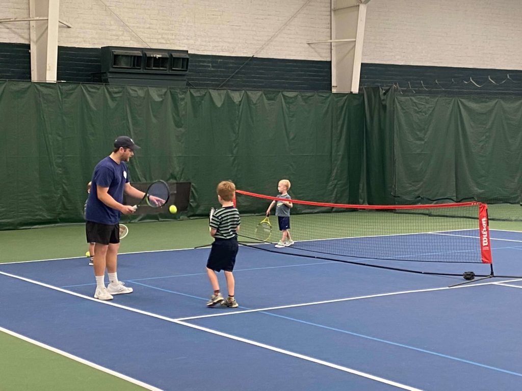practising with coach forest lake tennis club