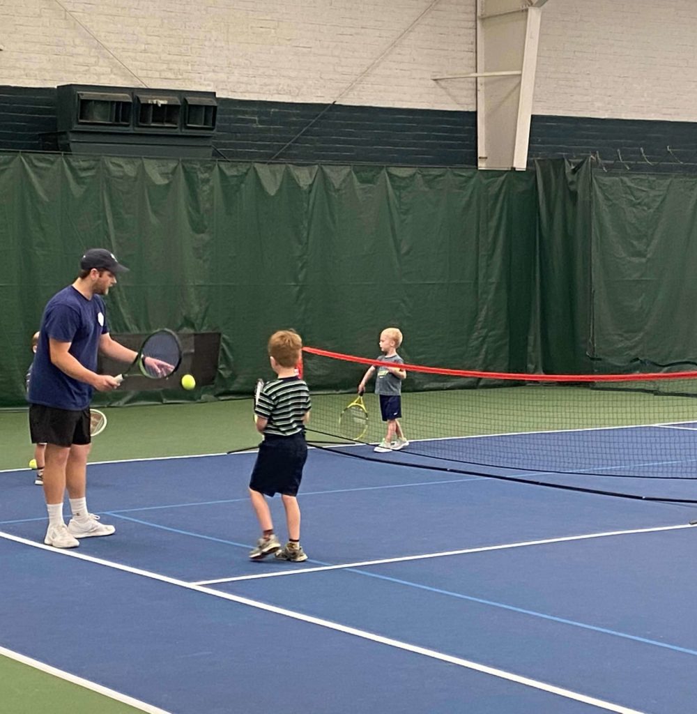 practising with coach forest lake tennis club